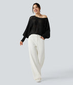 Załóż golf ajouré wokół długich spodni manches chauve-souris