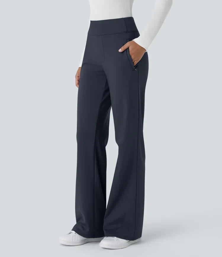 Pantalon Tailleur évasé à taille haute et poches laterales zippées