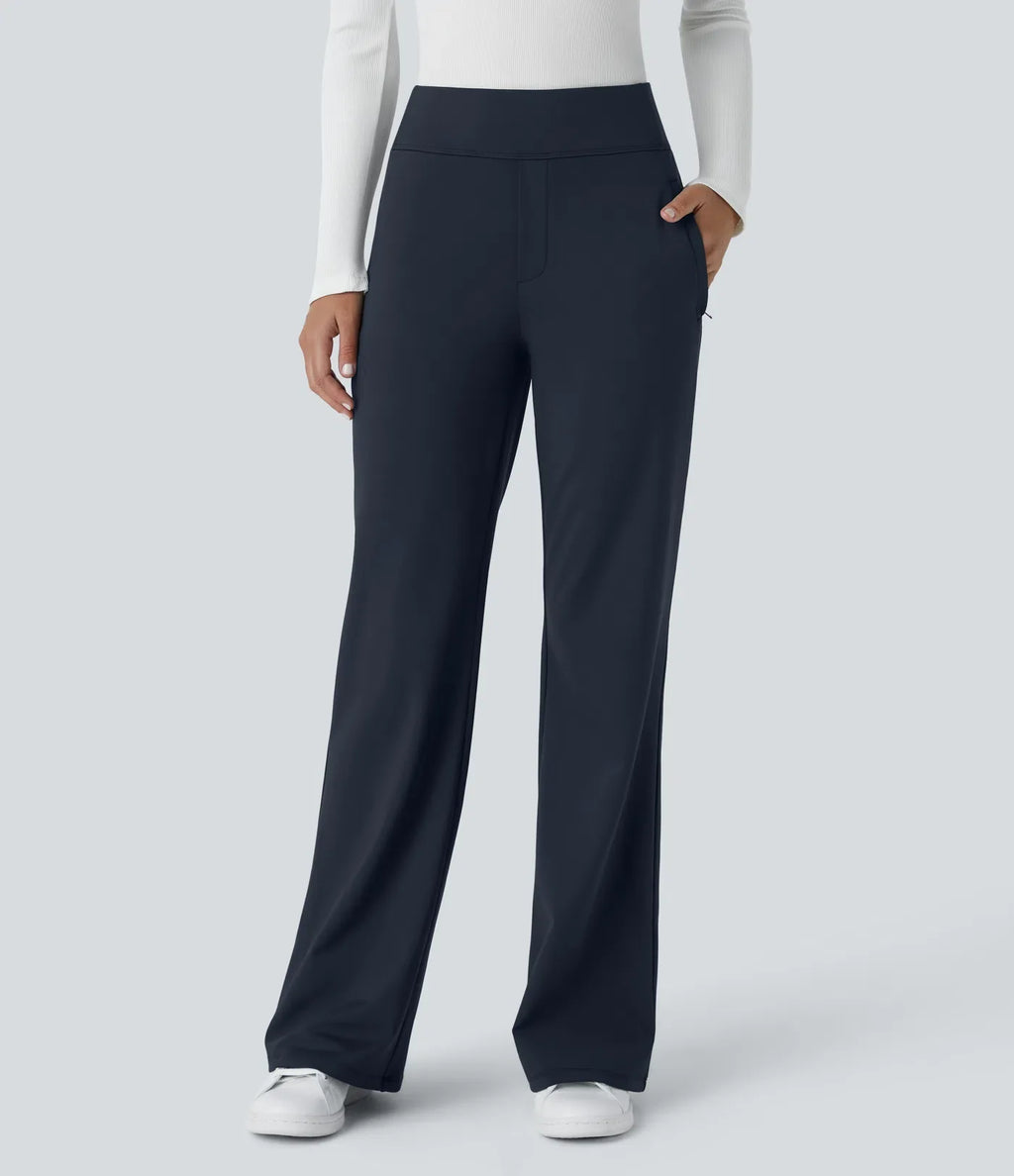 Pantalon Tailleur évasé à taille haute et poches laterales zippées
