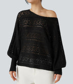 Załóż golf ajouré wokół długich spodni manches chauve-souris