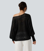 Załóż golf ajouré wokół długich spodni manches chauve-souris