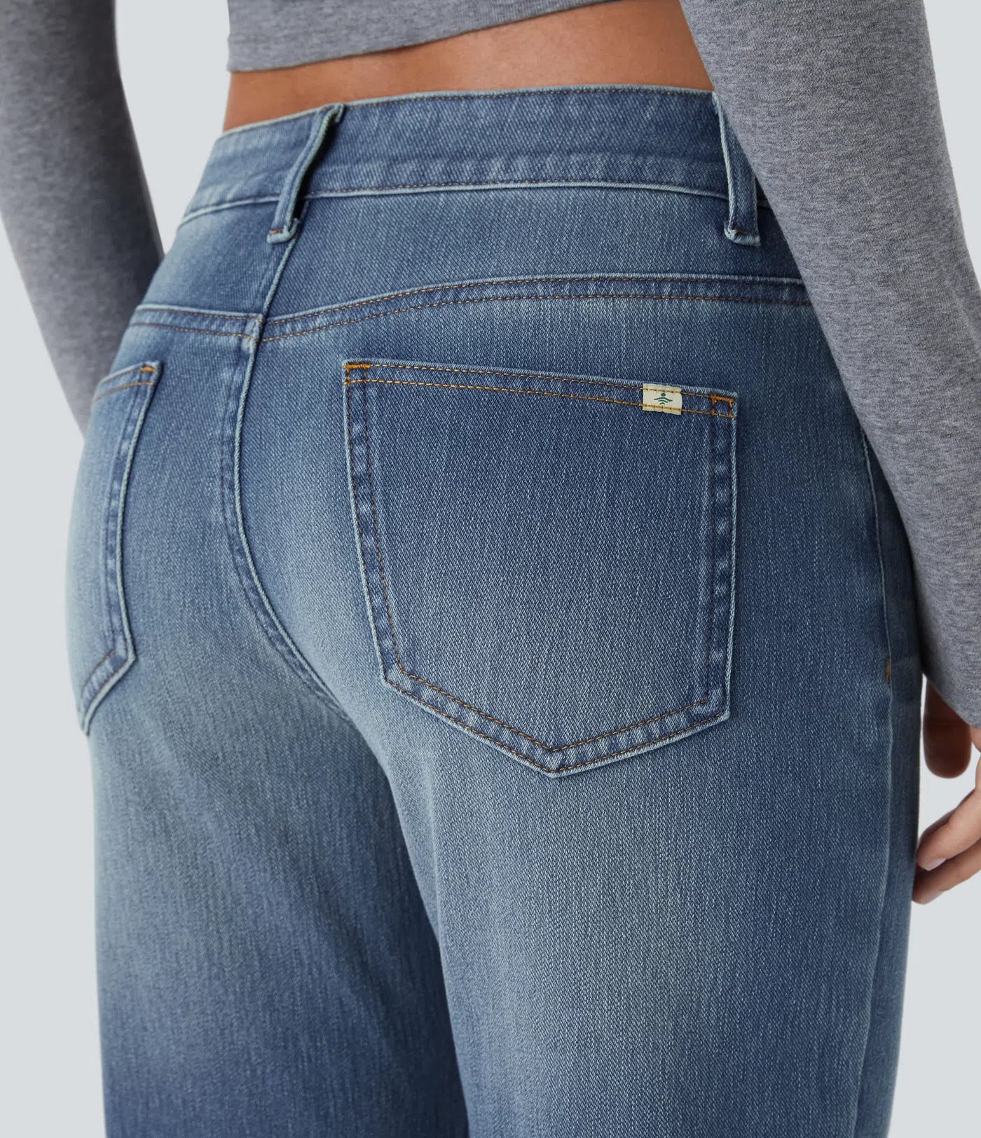 Jean bootcut délavé Etoile taille basse avec bouton, fermeture éclair et poches wielokrotności
